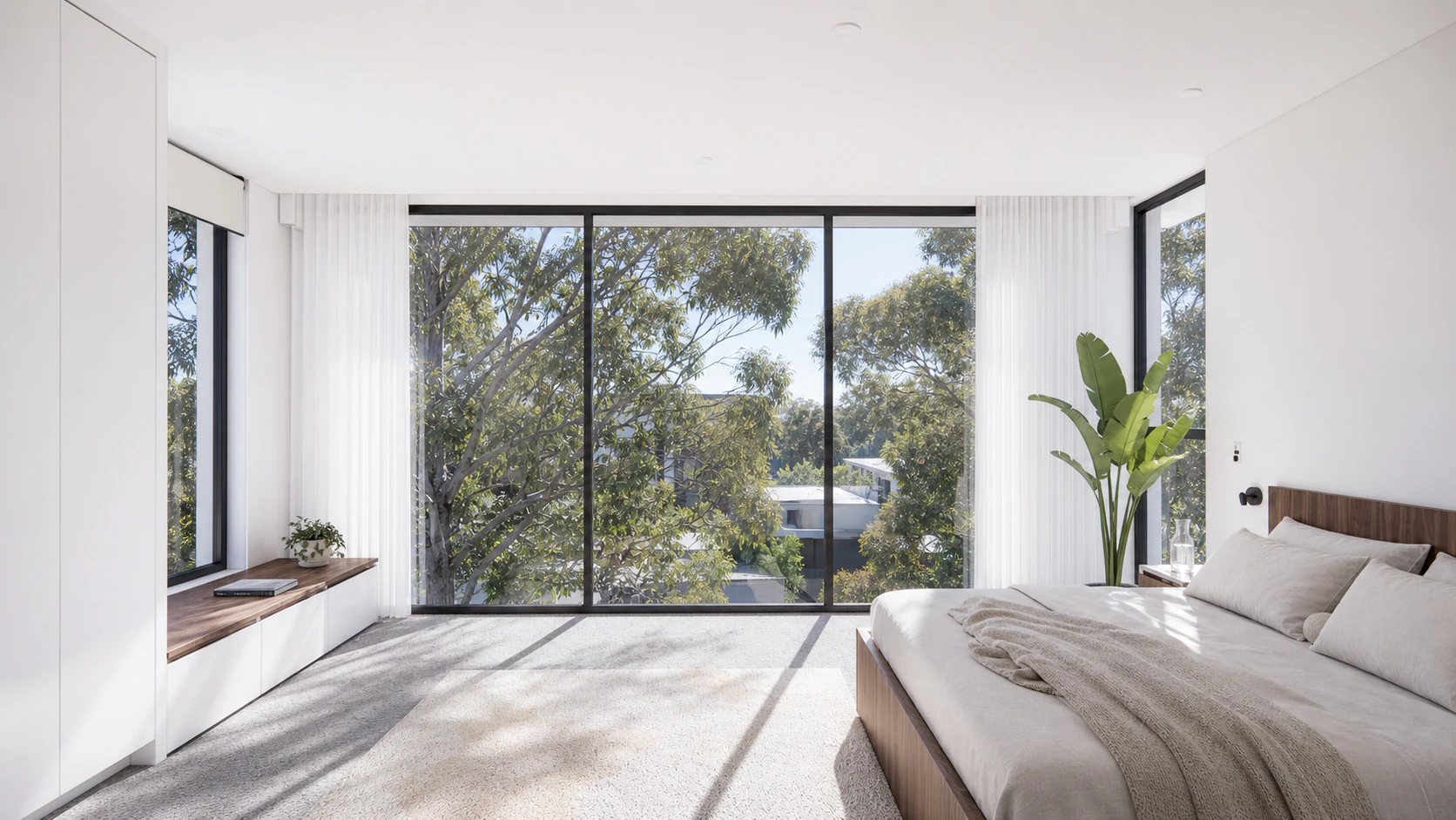 Calm bedroom with integrated timber joinery and a soft neutral palette.